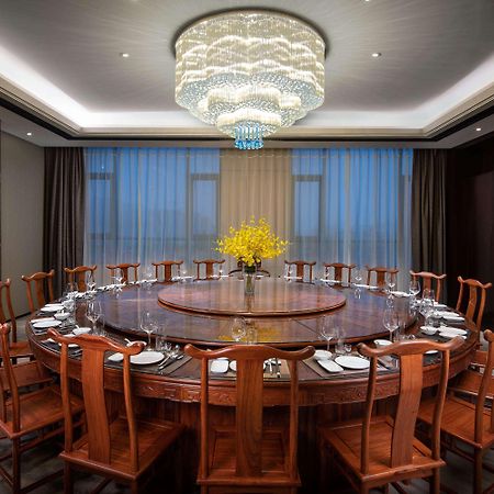 Hotel Ramada Wyndham Zhengzhou Xinzheng Xinzheng  Esterno foto