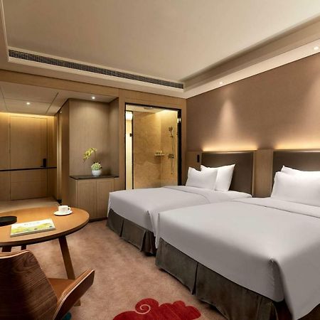 Hotel Ramada Wyndham Zhengzhou Xinzheng Xinzheng  Esterno foto