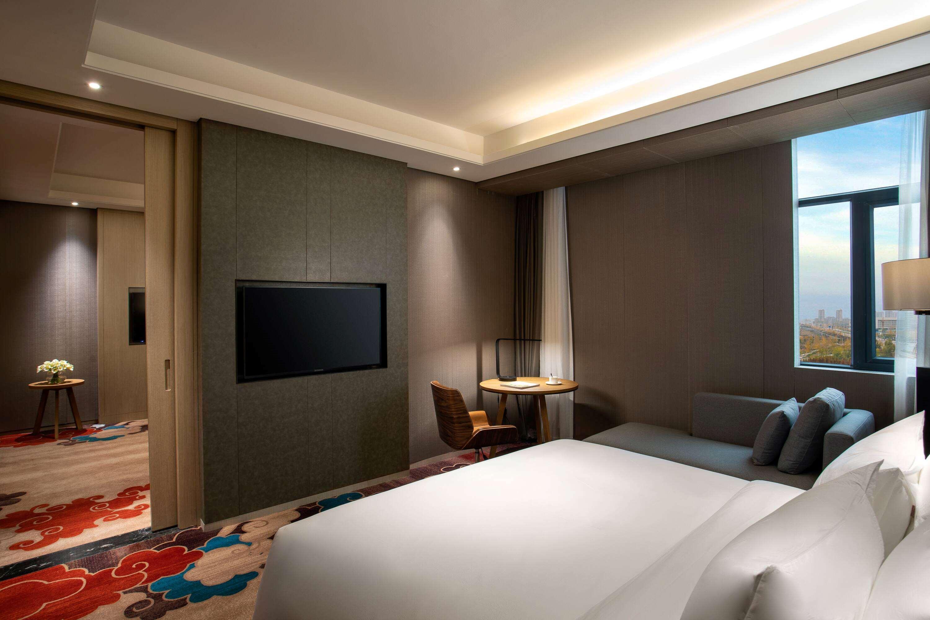 Hotel Ramada Wyndham Zhengzhou Xinzheng Xinzheng  Esterno foto
