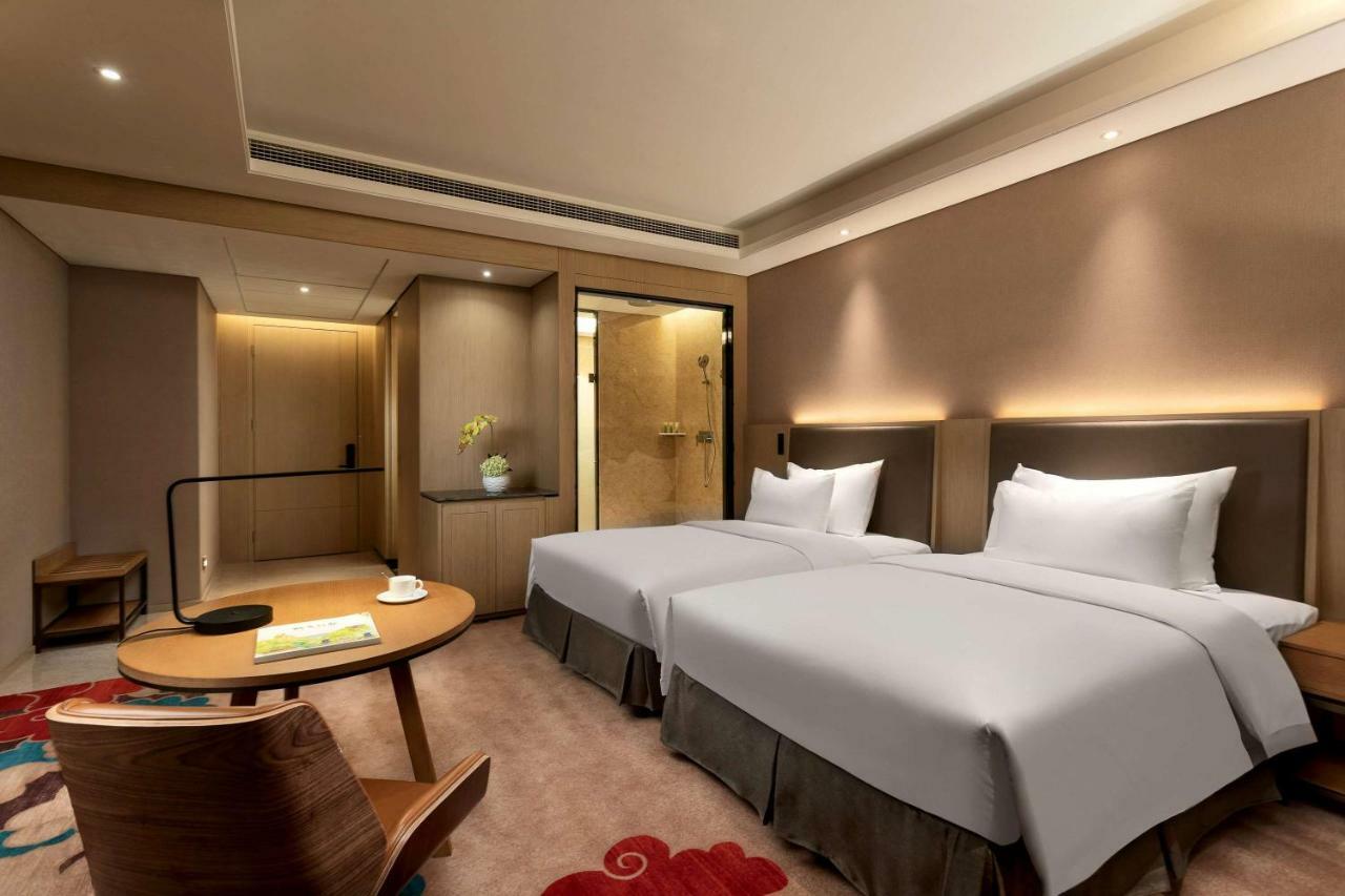Hotel Ramada Wyndham Zhengzhou Xinzheng Xinzheng  Esterno foto